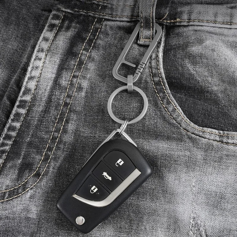 Titanium keychain clipped to jeans with car key