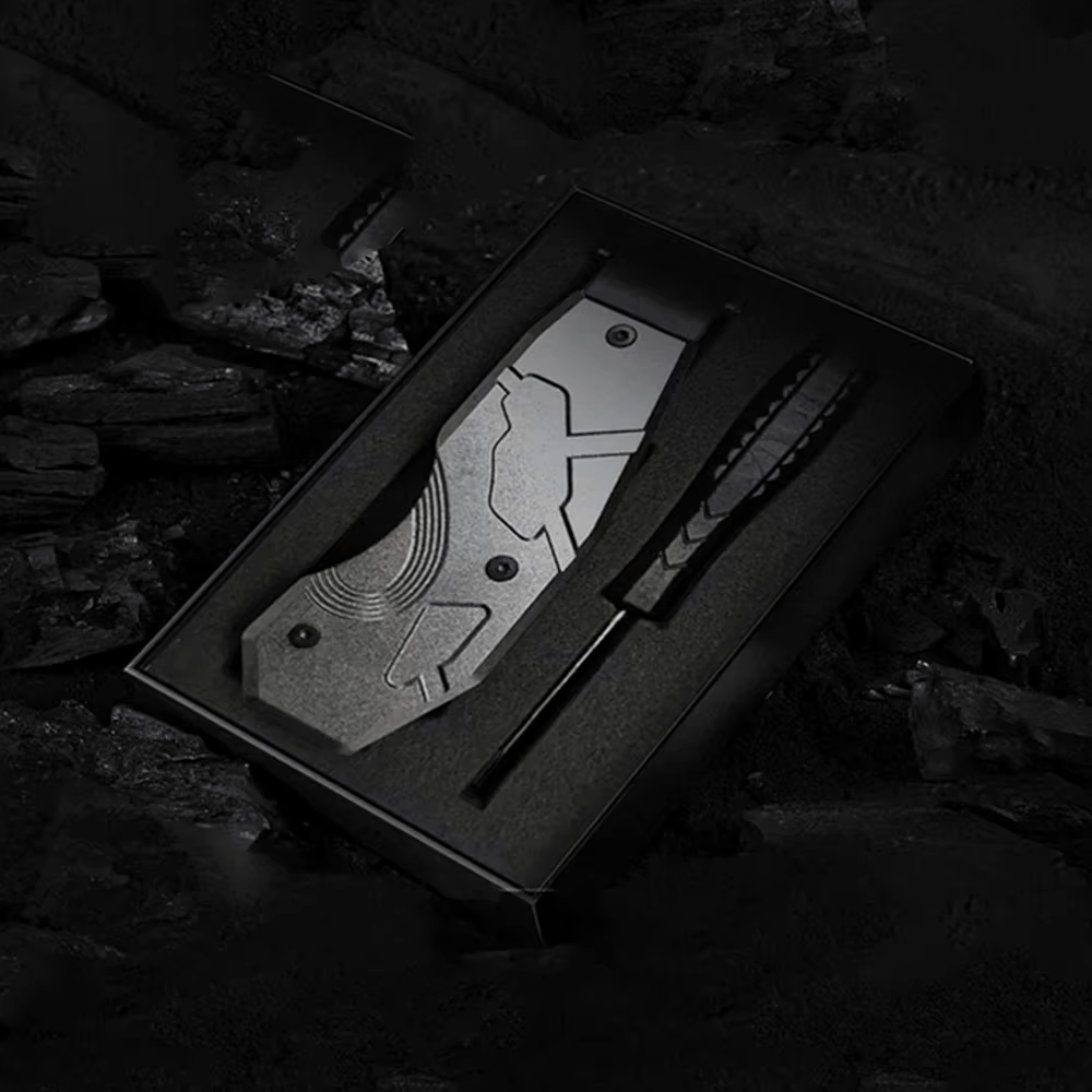 Key Holder with a geometric design in a dark box on a stone surface.