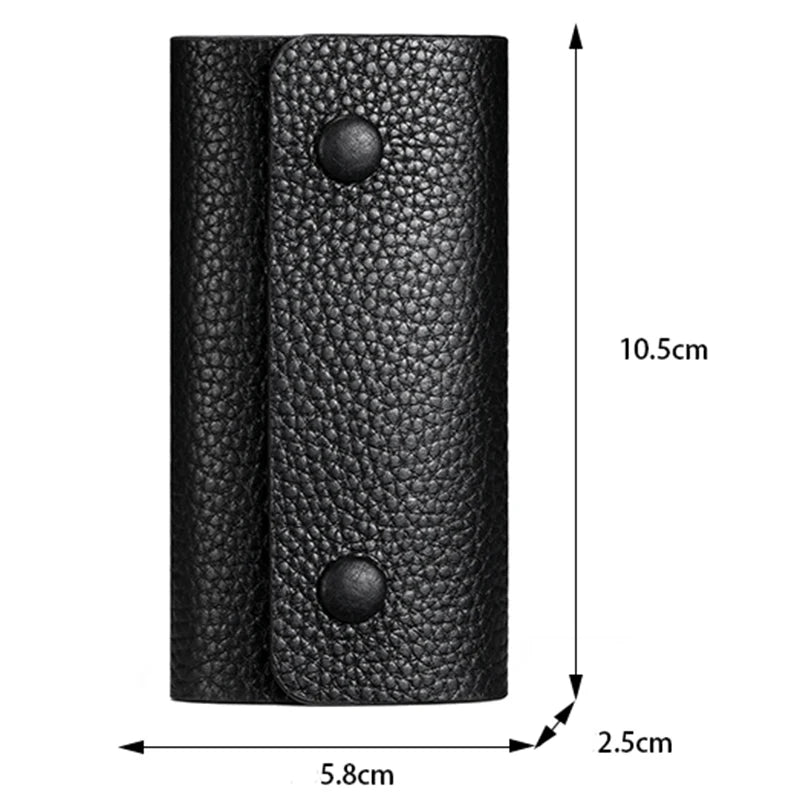 Black leather key holder with dimensions indicated on a white background