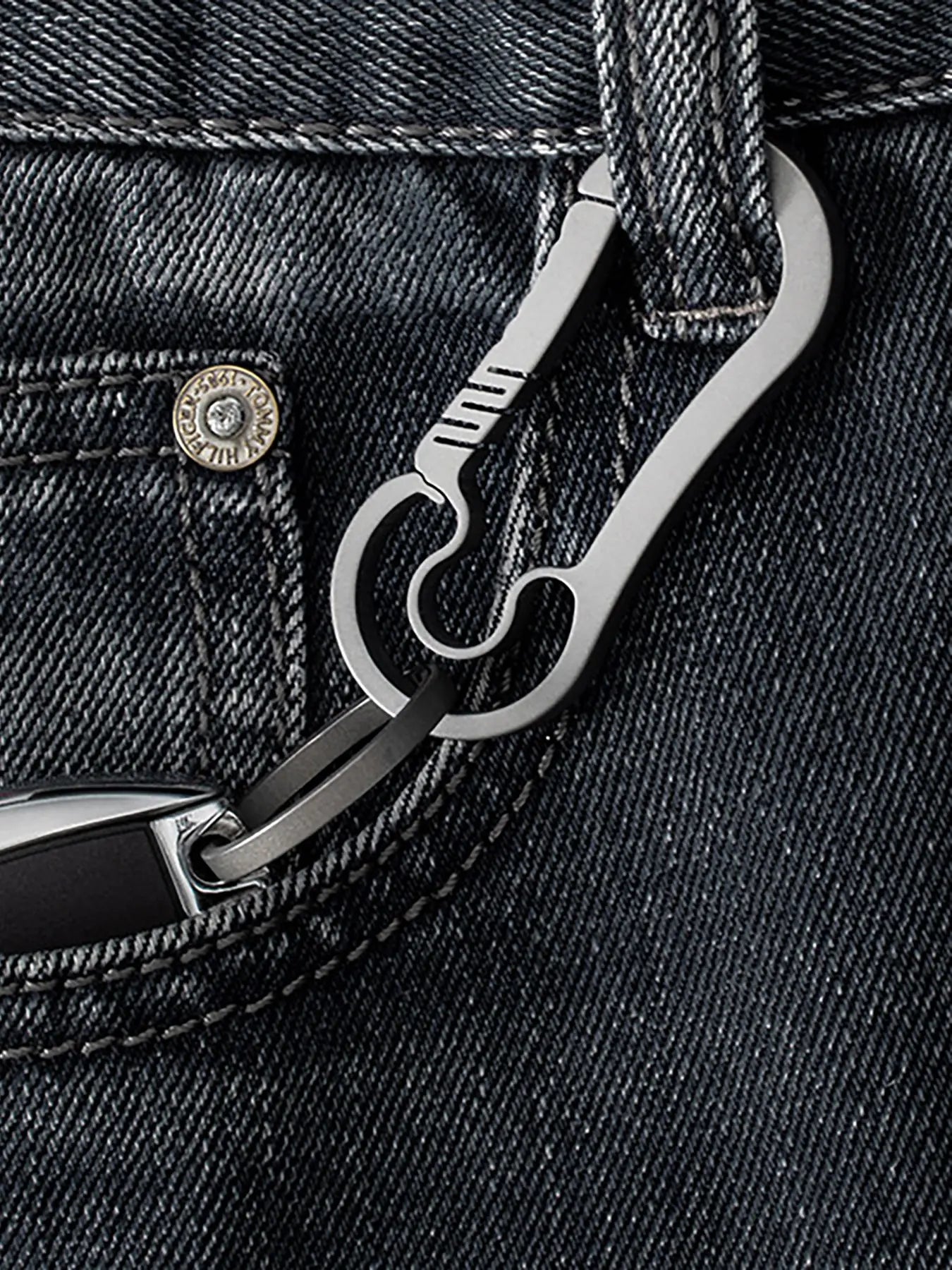 Gray Titanium Carabiner Clipped to jeans - EDC keychain by KeyCarabiner.