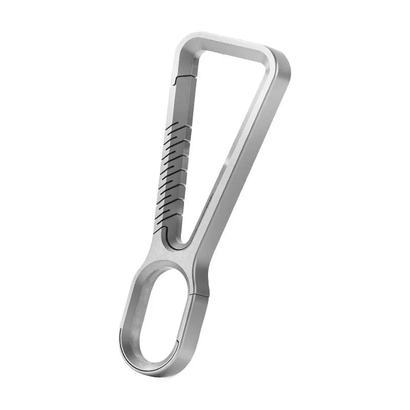 Polished titanium carabiner close-up on white background