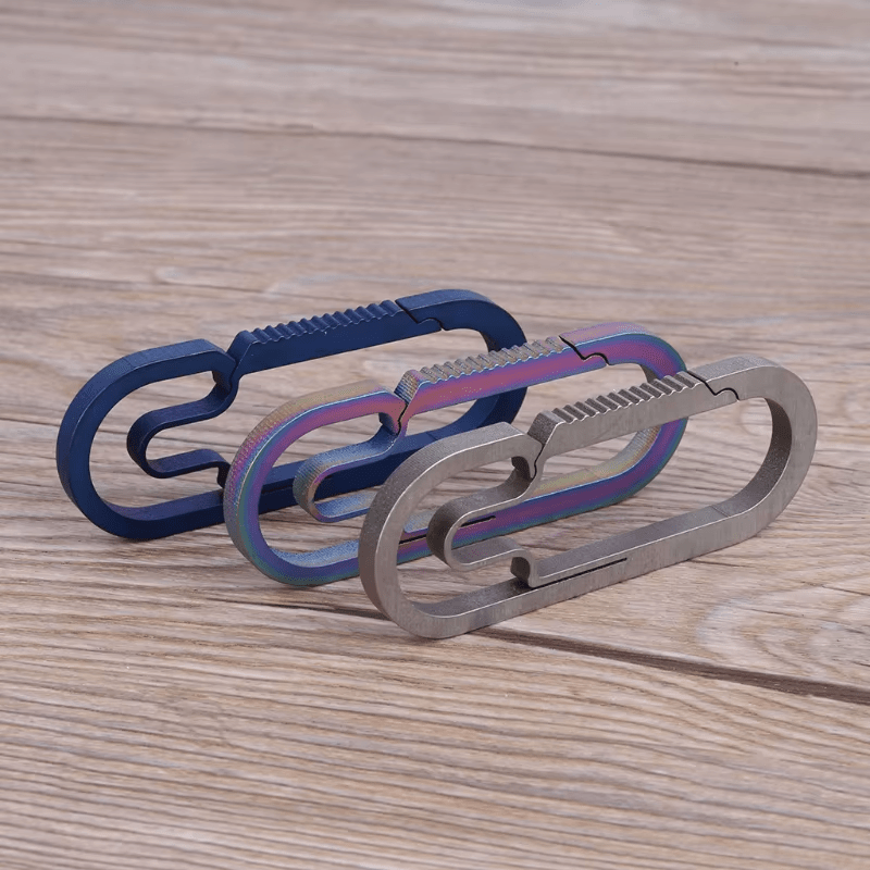 Set of three titanium alloy carabiners - EDC keychain collection.