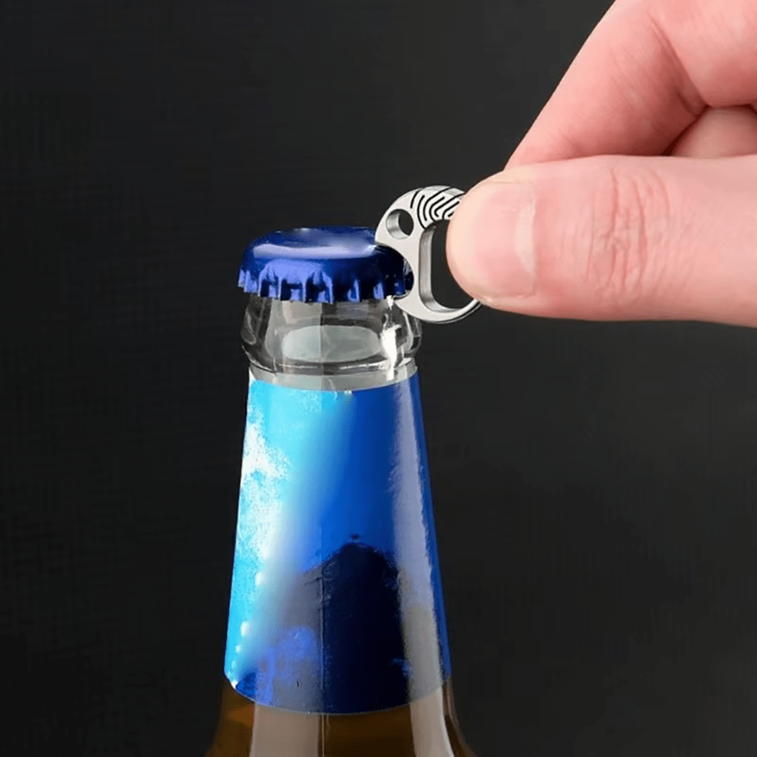 Titanium Carabiner used as a bottle opener - small EDC keychain tool.