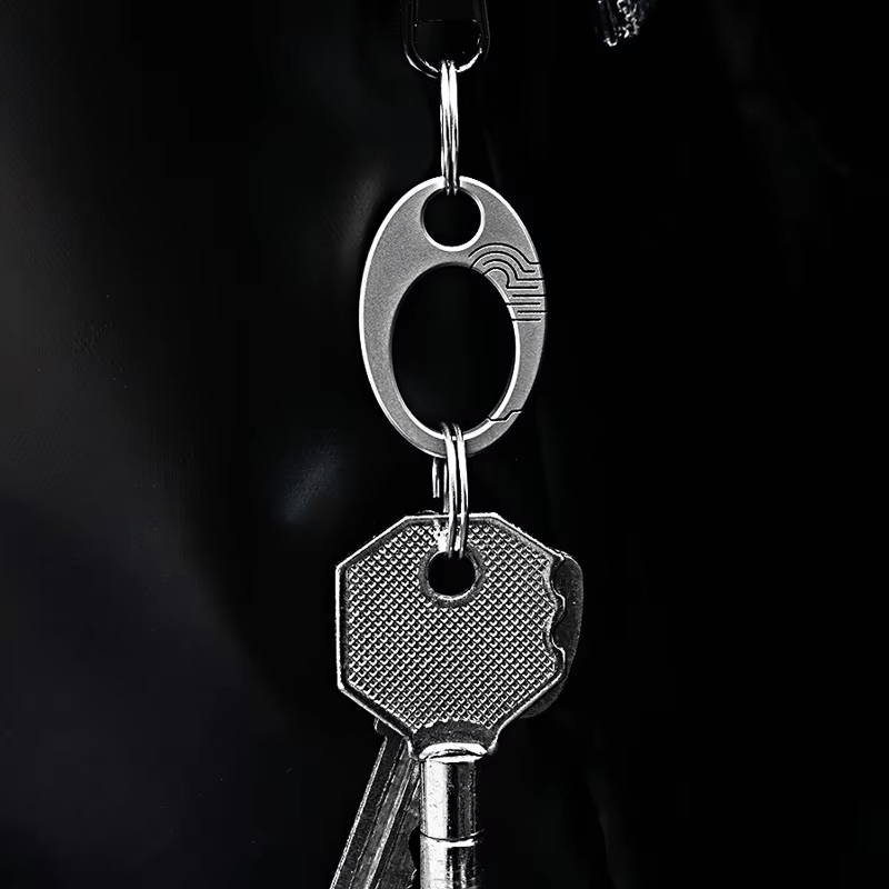 Titanium keychain buckle attached to keys on a keyring