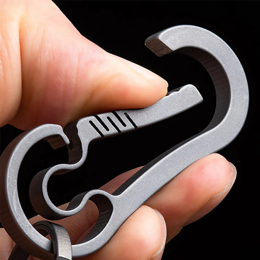 CNC Titanium Carabiner showing quick-release snap lock mechanism.