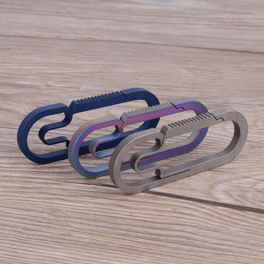 Set of three titanium alloy carabiners - EDC keychain collection.