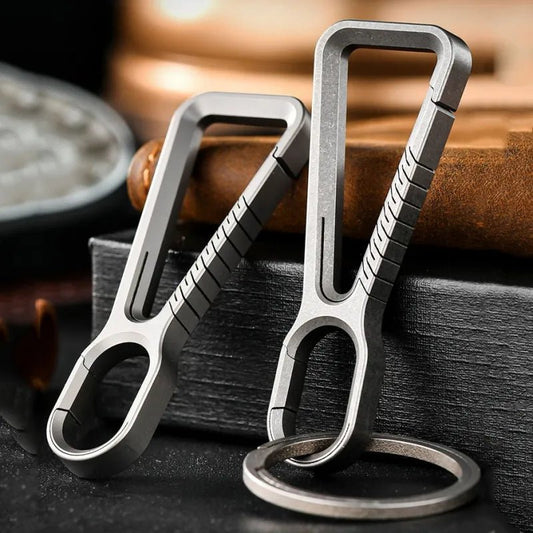 Pair of silver titanium carabiners displayed together